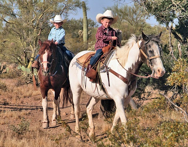 Children riding at White Stallion Ranch